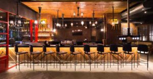 "Coffee served at Over The Moon Brew Company Hyderabad with modern café interiors”